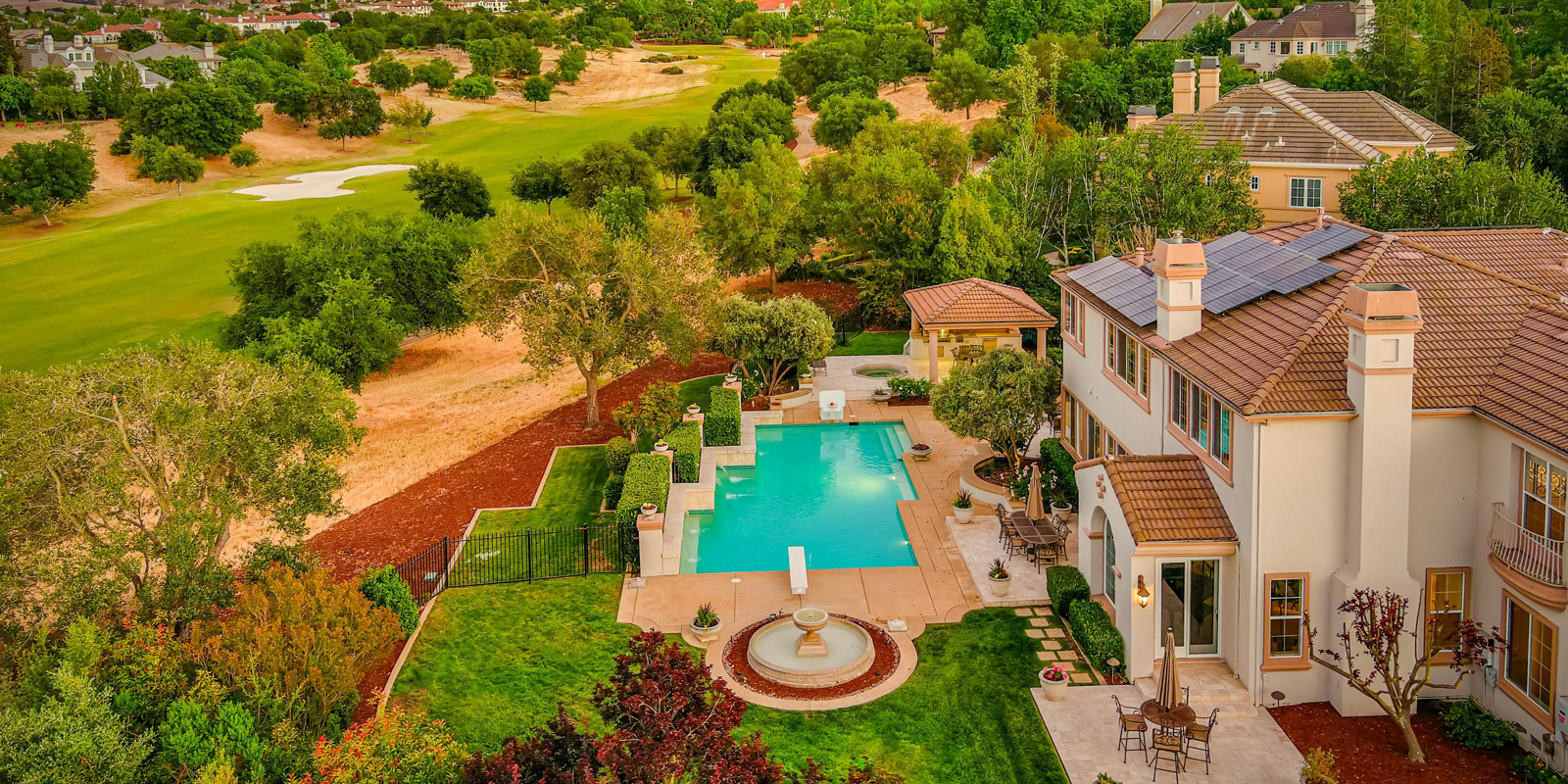 Aerial view of a home for sale with pool in Pleasanton, CA